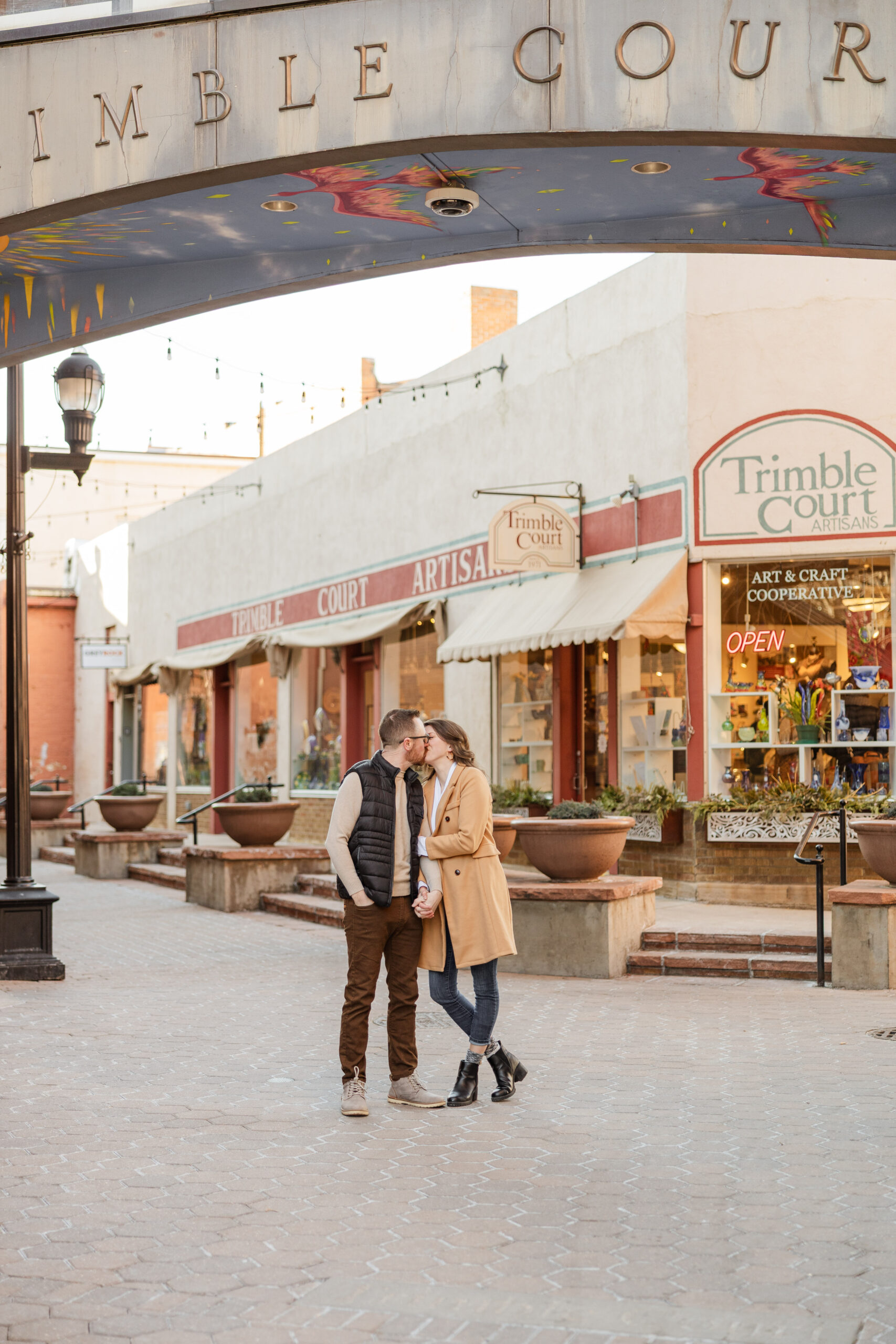 A downtown engagement photoshoot with a beautiful Colorado couple shot by Denver Wedding and engagement Photographer Haley Harr.